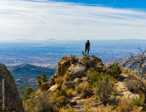 Female Hiker on Rocky Outcrop on El Rincon, Piedra Lisa South Trail , Sandia Wilderness Near Albuquerque, New Mexico, USA