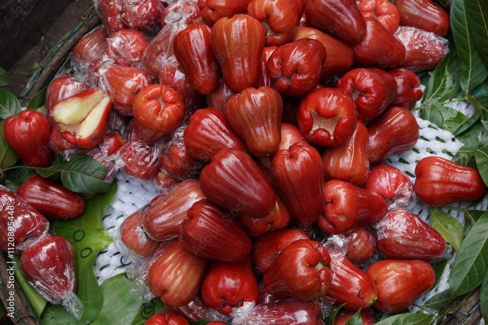 The rose apple is a red fruit from Vietnam that is shaped like a bell and has a flavour similar to unripe pears. It is also known as Quả Roi in the north and Quả Mận in the south. The rose apple is a red fruit from Vietnam that is shaped like a bell and has a flavour similar to unripe pears. It is also known as Quả Roi in the north and Quả Mận in the south.