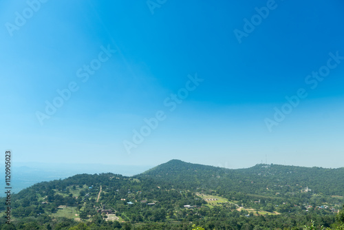 Small houses separated from each other on a mountain range., surrounded by trees. View of landmark of Khao Yai Thieng Windmill Nakhon Ratchasima Thailand. photo