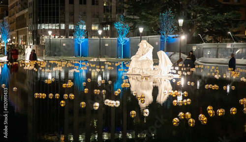Canvas Print Nativity scene in Temple SquareChristmas night statue on lake