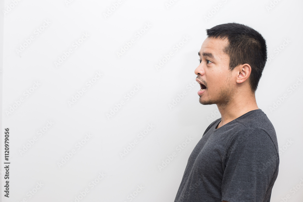Portrait of business asian man make mount shout out from hand facial face Portrait of business asian man make mount shout out from hand facial face