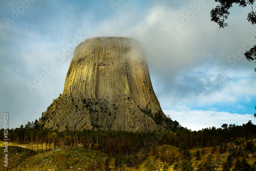 Devils Tower National Monument under partly sunny sky photo