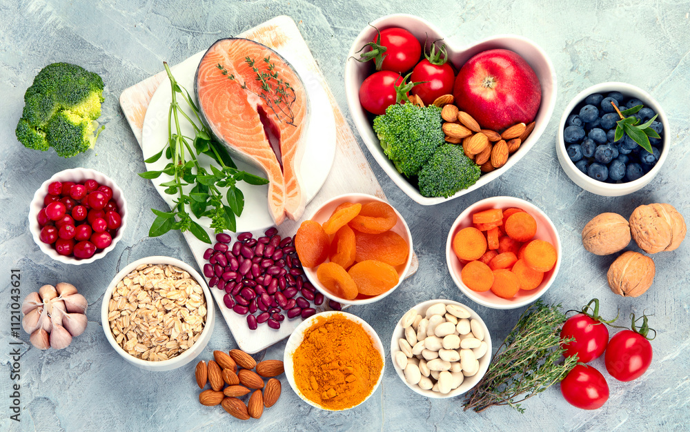 Best products for heart on dark gray background. Clean eating concept. Best products for heart on dark gray background. Clean eating concept.