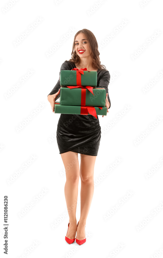 Young woman with gifts on white background. New Year celebration Young woman with gifts on white background. New Year celebration
