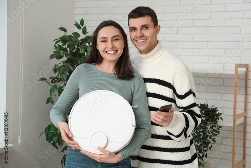 Young couple with modern ro...