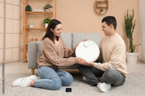 Young couple with modern ro...