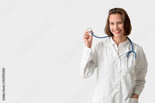 Happy female doctor with st...