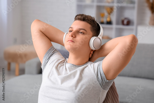 Teenage boy in headphones l...