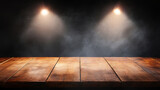 暗い背景にスポットライトと木製テーブル