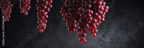 Dark background with suspended red grapes, evoking a sense of weightlessness and serenity, ambient, tranquility