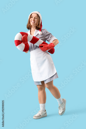 Young chambermaid with Sant...