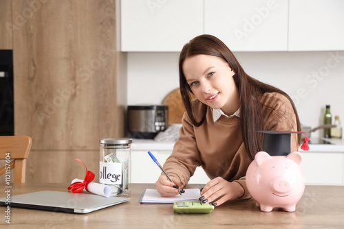 Young woman with savings fo...