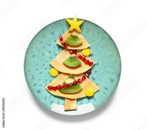 Plate with pancakes in shape of Christmas tree isolated on white photo