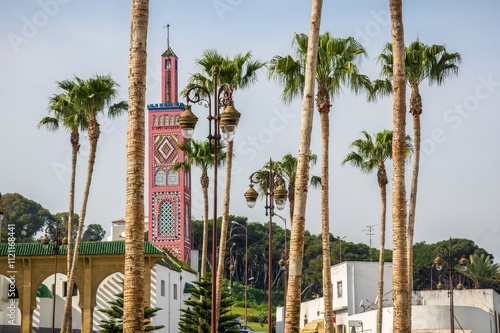 Pink mosque and palmtrees in Tanger, Morocco