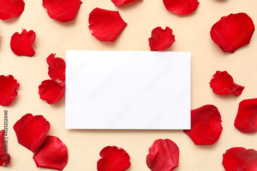 Blank card with beautiful red rose petals on beige background Blank card with beautiful red rose petals on beige background
