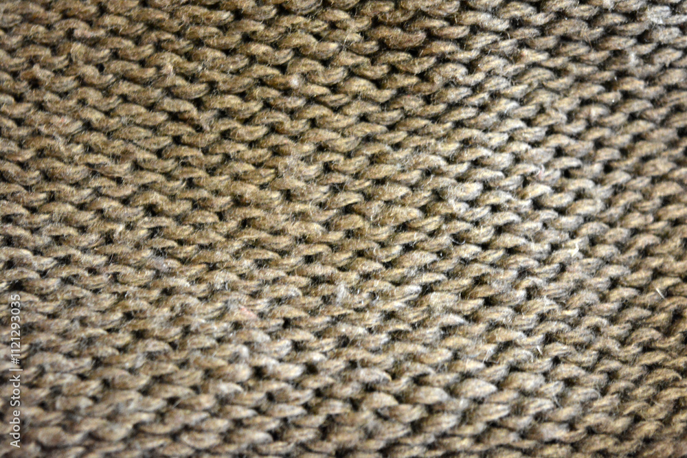 Women's clothing, stylish knitwear made of natural woolen dense threads. Beautiful patterns, braids, nice, soft braided woolen fabric. Women's clothing, stylish knitwear made of natural woolen dense threads. Beautiful patterns, braids, nice, soft braided woolen fabric.
