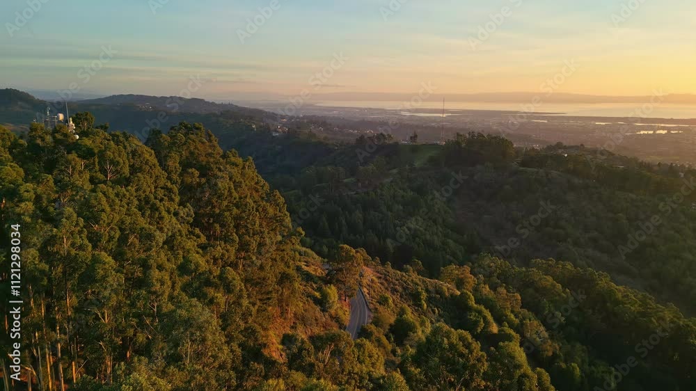 Witness stunning aerial views from Grizzly Peak Blvd Overlook as the sun sets over the horizon. Witness stunning aerial views from Grizzly Peak Blvd Overlook as the sun sets over the horizon.