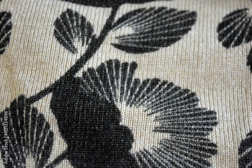 Knitwear, women's clothing, cotton products, unusual fabric backgrounds. Beige fabric, finely weaved, dyed with large black flowers with leaves on a background of small gathering, elastic.