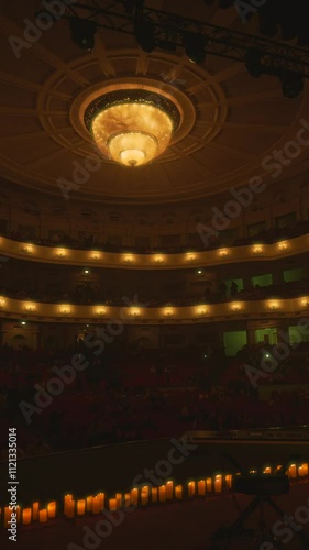 An ancient concert hall.
Opera hall.
Opera theater.
Chandelier at the Opera House.
An antique chandelier on the ceiling.