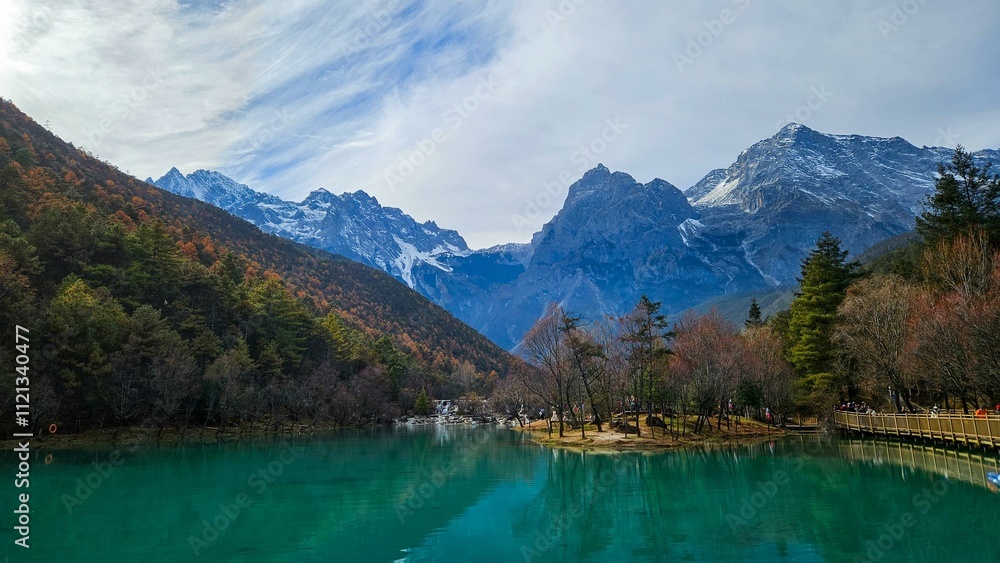 Serene Mountain Lake with Snow-Capped Peaks and Forest Reflections, Lijiang, China Serene Mountain Lake with Snow-Capped Peaks and Forest Reflections, Lijiang, China