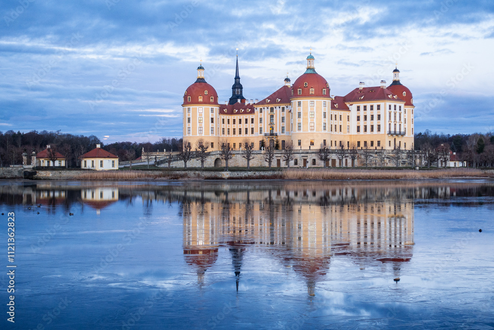 Moritzburg Castle in winter during sunrise Moritzburg Castle in winter during sunrise