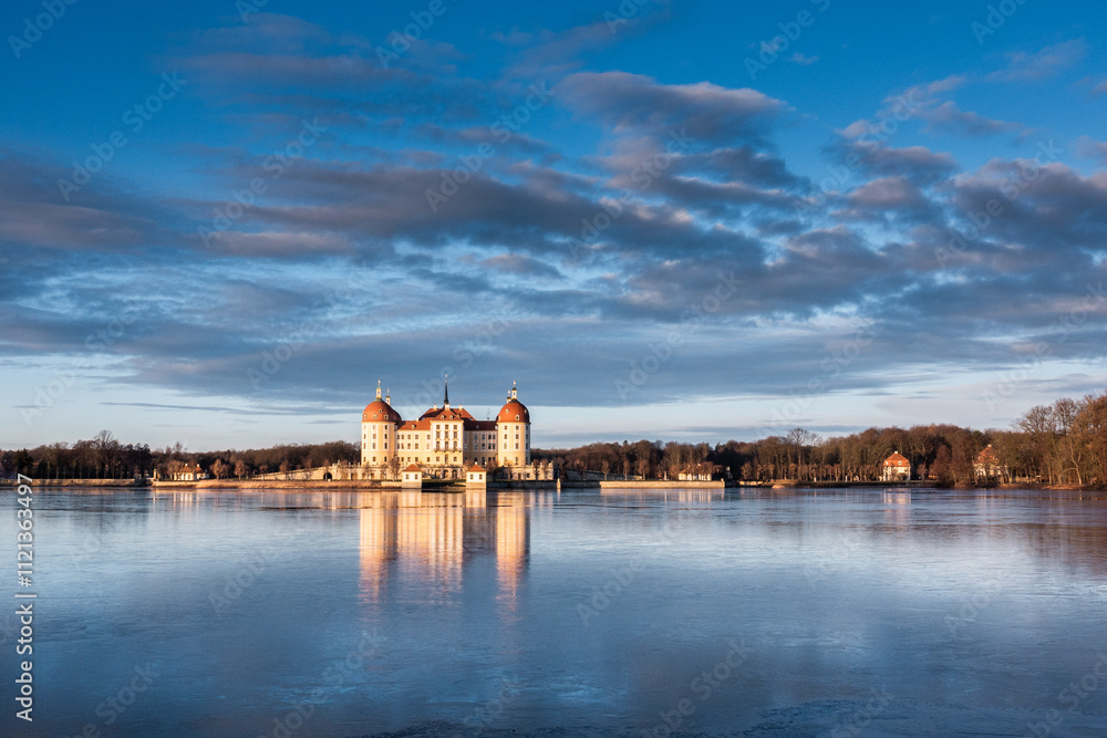 Moritzburg Castle in winter during sunrise Moritzburg Castle in winter during sunrise
