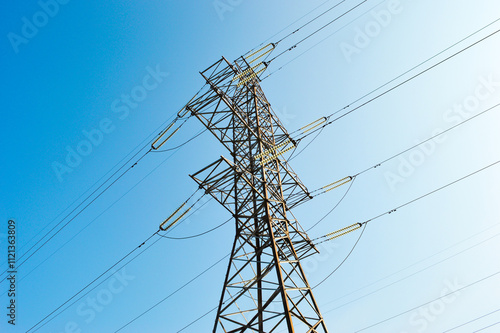 Power lines on blue sky background