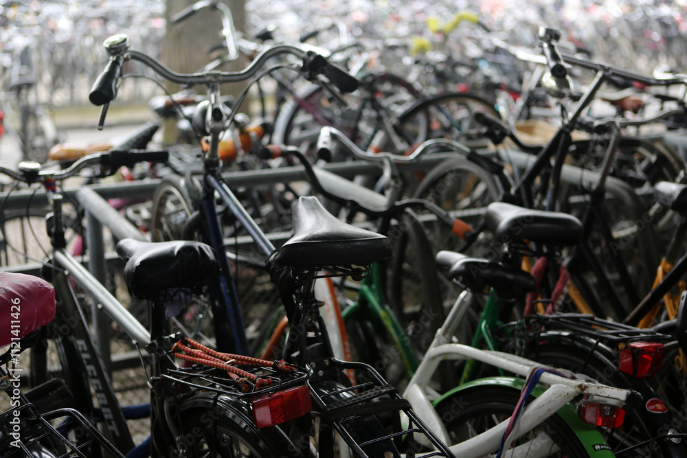 Bicycles parked at the Central Railway station - Amsterdam - Holland - The Netherlands Bicycles parked at the Central Railway station - Amsterdam - Holland - The Netherlands
