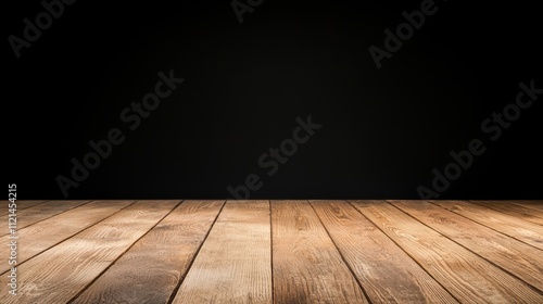 Wooden floor against a black background creating a warm, inviting atmosphere