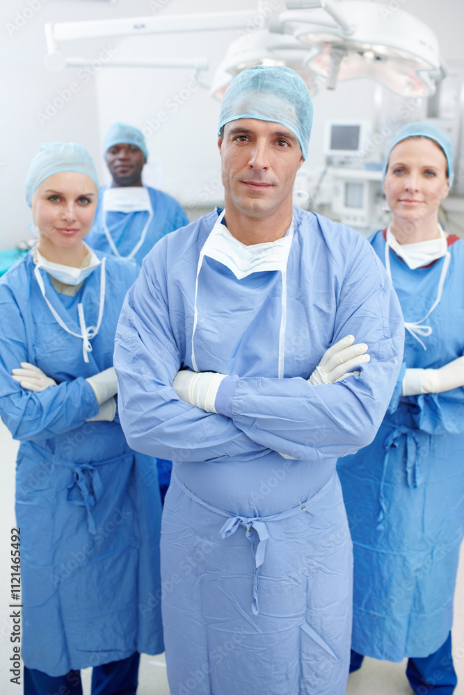 Teamwork, doctors and smile in portrait for theater, medical surgery and procedure with confidence. Hospital, surgeons and man leader with arms crossed for operating room, clinic and ppe for safety Teamwork, doctors and smile in portrait for theater, medical surgery and procedure with confidence. Hospital, surgeons and man leader with arms crossed for operating room, clinic and ppe for safety