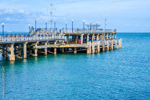 Swanage, Dorset, England, UK - April 2021: Swanage Pier, Victorian pier on the eastern coast of the Isle of Purbeck photo