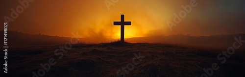 Silhouette of a Christian Cross Against a Dramatic Glowing Sky