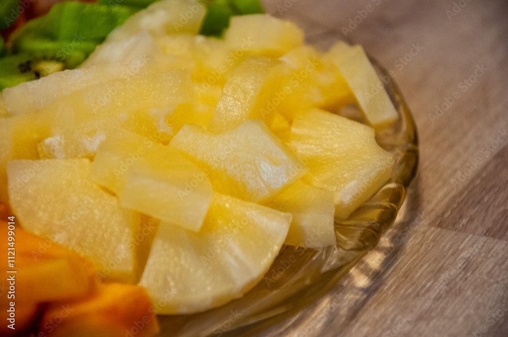 Tropical salad. Island food. Luxury fruit mix. Tropical food. Exotic fruit. Exotic summer fruits of pineapple. Exotic vitamin salad. Tropical harvest Tropical salad. Island food. Luxury fruit mix. Tropical food. Exotic fruit. Exotic summer fruits of pineapple. Exotic vitamin salad. Tropical harvest