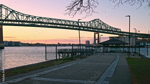 View of one of the most iconic landmarks of Boston, the Tobin bridge at sunrise spanning over the Mystic river. photo