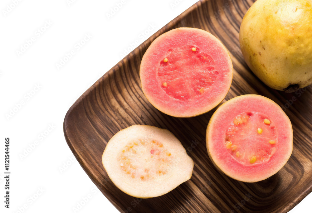Guava fruit halves on the wooden tray isolated with transparent background Guava fruit halves on the wooden tray isolated with transparent background