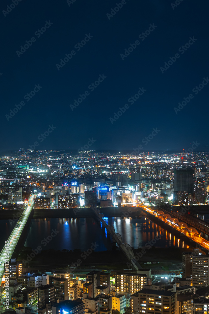 Two Osaka Bridges Illuminated at Night from Umeda Sky Building Observatory Deck Two Osaka Bridges Illuminated at Night from Umeda Sky Building Observatory Deck