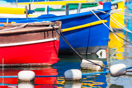 NICE, FRANCE:  detail of colorful “pointu” traditional wooden boats in 