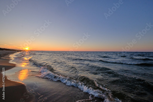 Fototapeta Naklejka Na Ścianę i Meble -  Summertime sunset by Baltic Sea