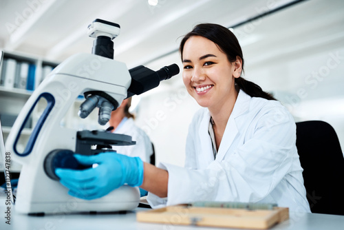 Happy woman, portrait and forensic scientist with microscope at lab for scientific research, test or discovery. Female person, microbiologist or smile with equipment for clinic trial, exam or results photo