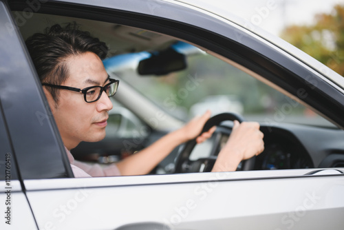 車を運転する男性 photo