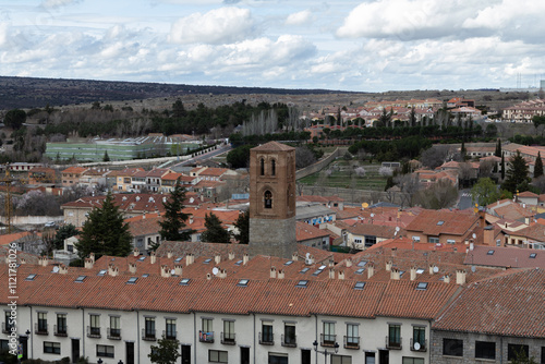 Church of San Martín in Avila, Spain, is captured in all its historical glory. This Romanesque masterpiece is a key landmark in the heart of the medieval city photo