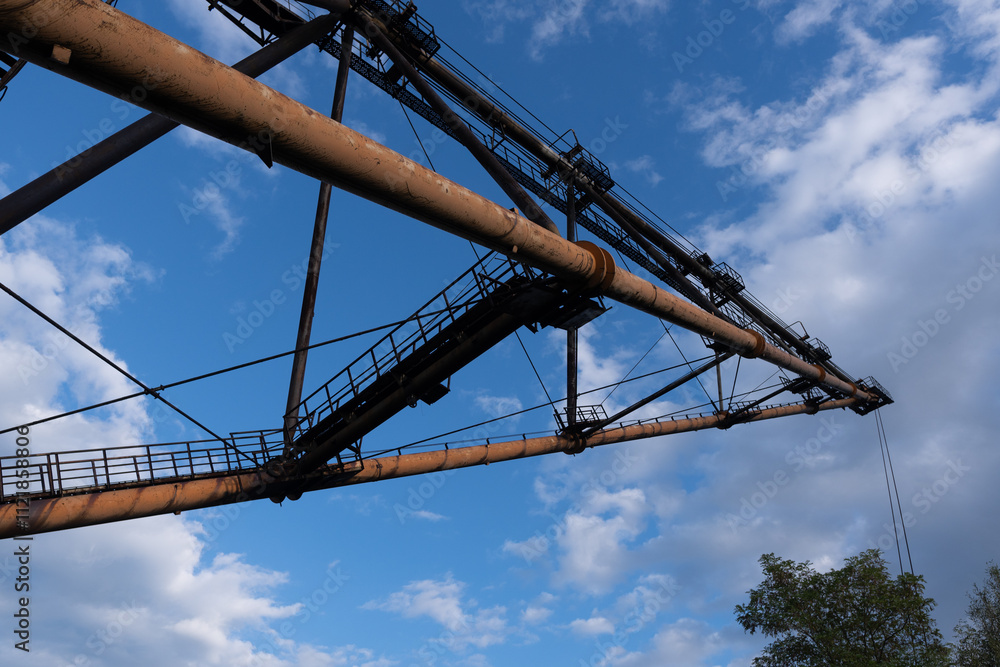 Industrial Crane Against a Blue Sky Industrial Crane Against a Blue Sky