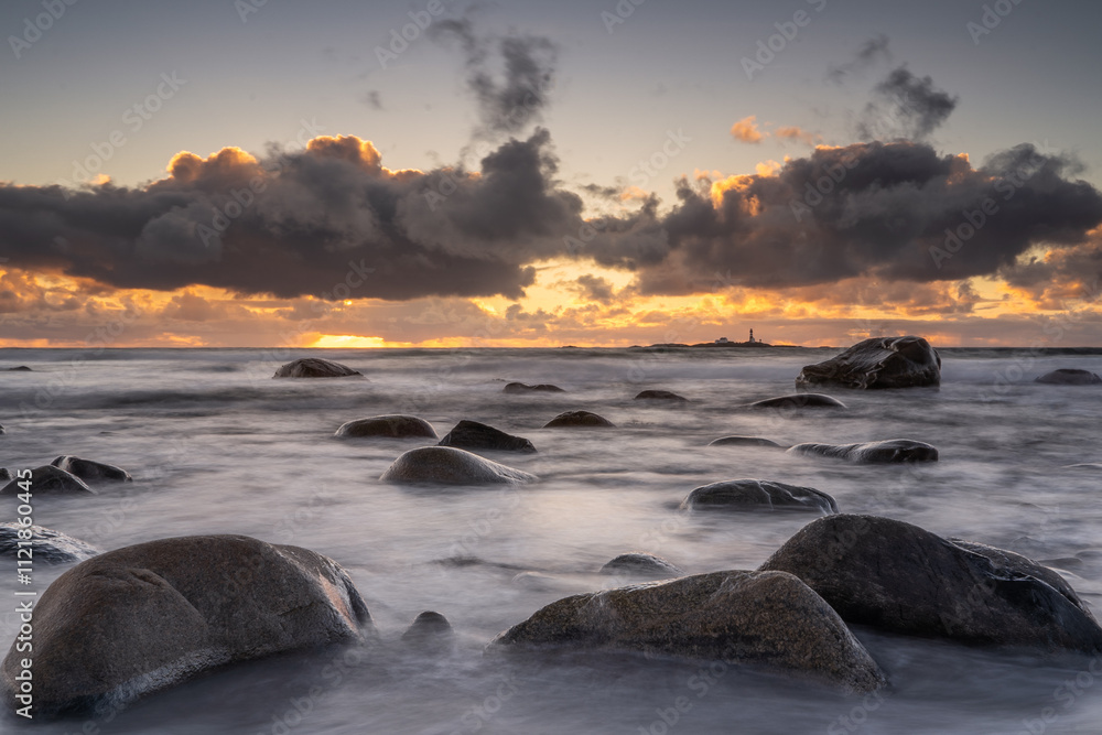 Obraz premium Stunning Sunset at the Coast – Long Exposure Capturing the Smooth Flow of Water and Vibrant Sky Colors, Creating a Peaceful and Serene Seaside Landscape Norway Norge - Jæren, jærstrendene