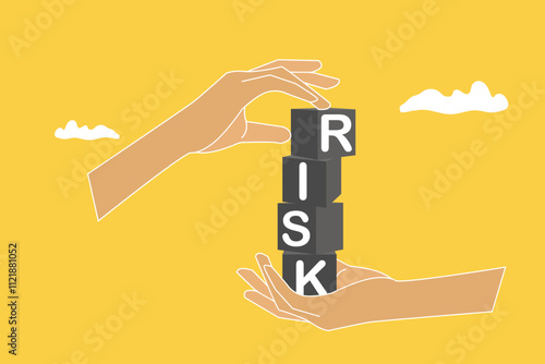 Businessman hand putting risk wording print screen on block cube for financial banking risk analysis and management. concept of low risk low return, risk management