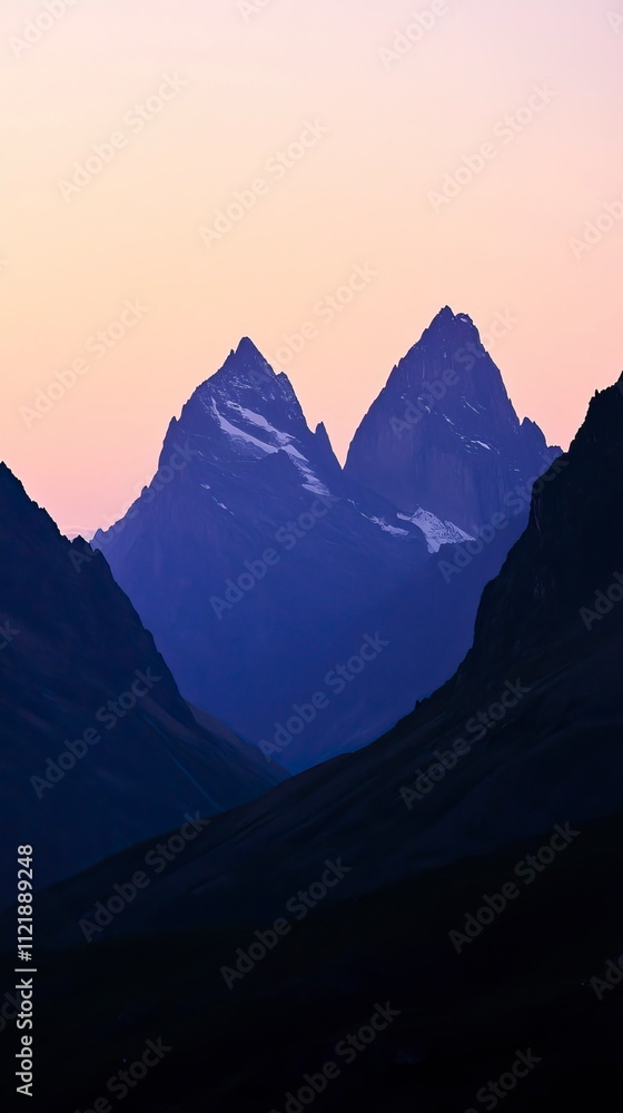 Obraz premium Silhouette of Snow Covered Mountains at Sunset Winter Sunrises and Sunsets, Winter season, Happy New Year, Happy Christmas 