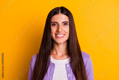 Photo portrait of smiling brunette isolated on yellow color background photo