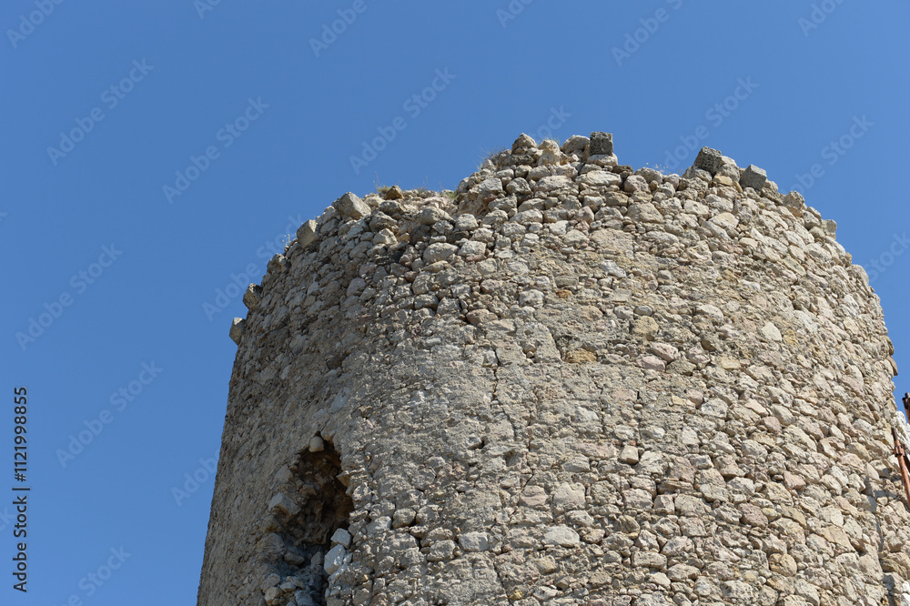 Naklejka premium The tower of the Donjon of the Genoese fortress of Cembalo on Mount Castron in the city of Balaklava