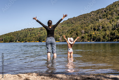 Sunny Lake Day with Woman and Child at Lago Moreno, Bariloche