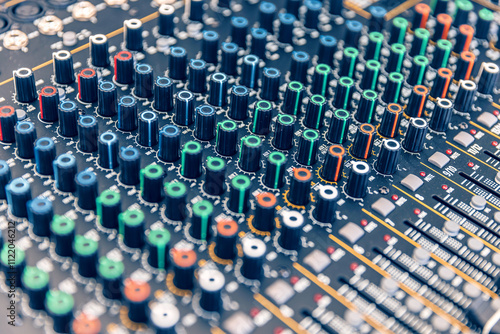 Close up view of a mixing console