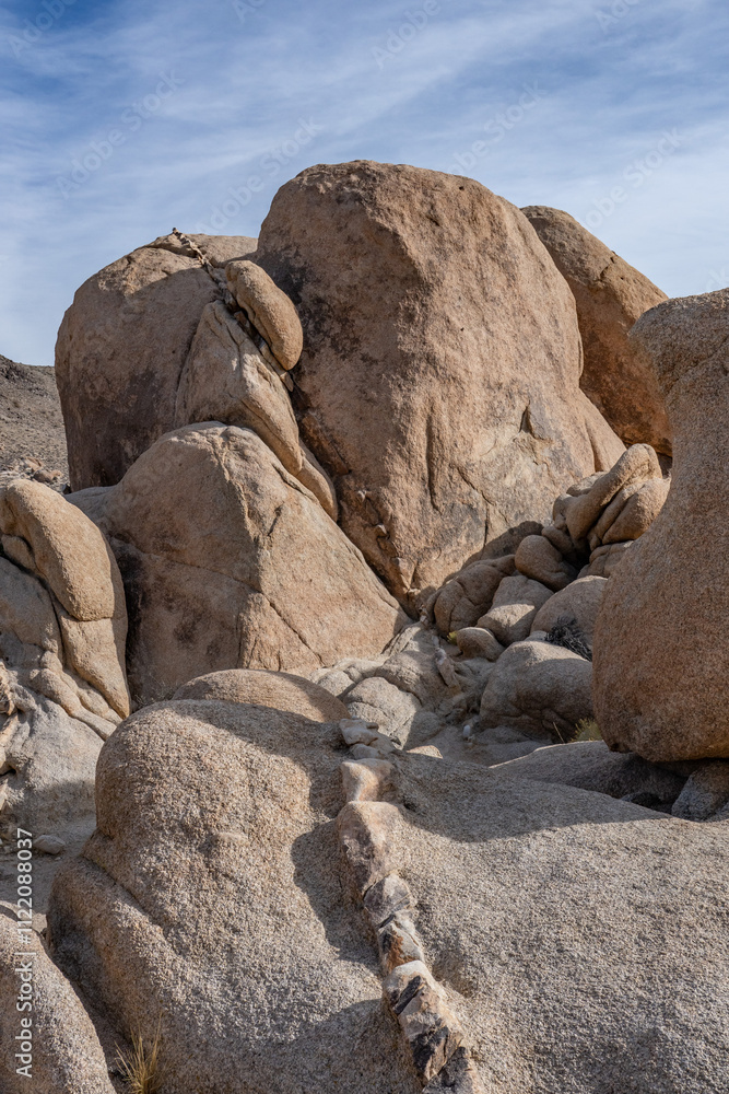 Dike or dyke. Weathered Granitic Rocks. White Tank Quartz Monzonite. White Tank Campground,Joshua Tree National Park, California geology. Mojave Desert Dike or dyke. Weathered Granitic Rocks. White Tank Quartz Monzonite. White Tank Campground,Joshua Tree National Park, California geology. Mojave Desert